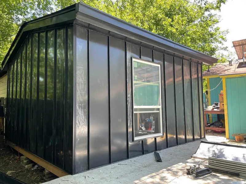 Black standing seam metal wall panels for Metal Roof Installation in Tahlequah