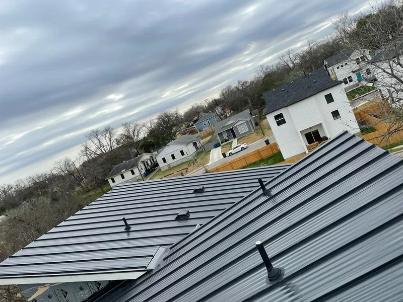Standing seam metal roof panels with vents for Skylight Repair in Tahlequah